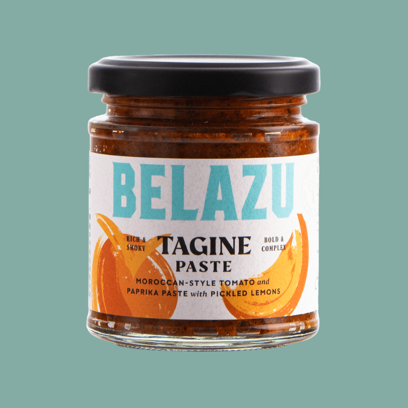 Jar of Belazu Tagine Paste on a teal background