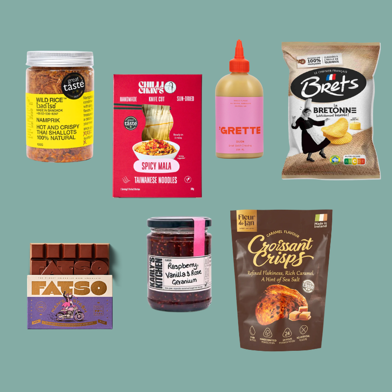 A collage of six packaged consumer goods on a muted green background: a jar of wild rice lid lime snack mix, a box of chili cheese spicy mala dumplings, a bottle of Grette mustard, a bag of Bret's Bretonne potato chips, a box of FATSO chocolate bars, and a bag of Fleur du Pan Croissant Crisps.
