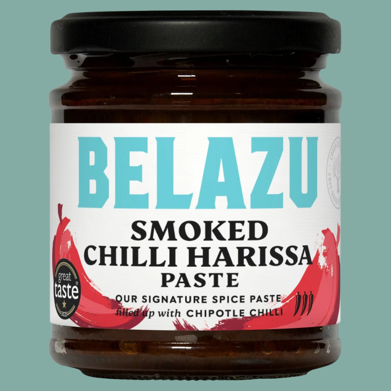 Jar of Belazu Smoked Chilli Harissa Paste on a teal background
