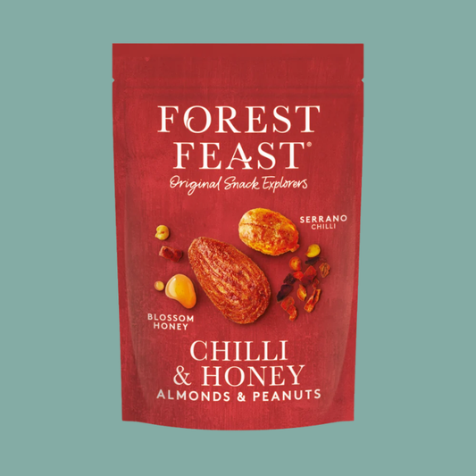 Forest Feast Chilli & Honey Almonds & Peanuts snack mix in a red stand-up pouch, shown against a solid teal background.