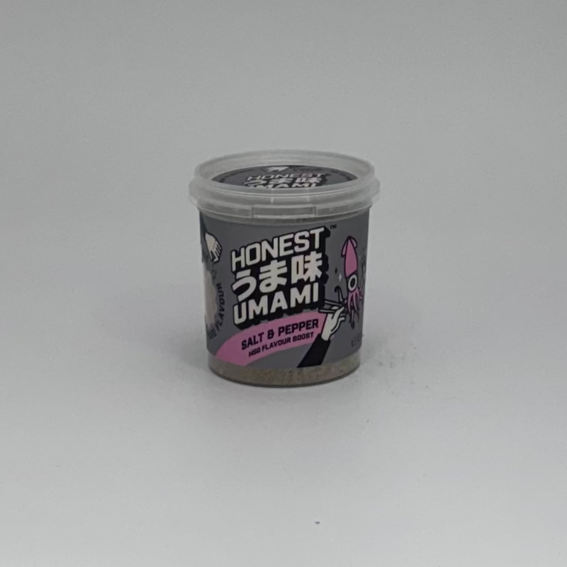Honest Umami Salt & Pepper on a white background with a light source on the left