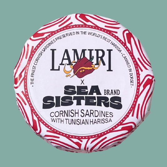 Lamiri x Sea Brand Sisters cornish sardines with Tunisian harissa on a green background