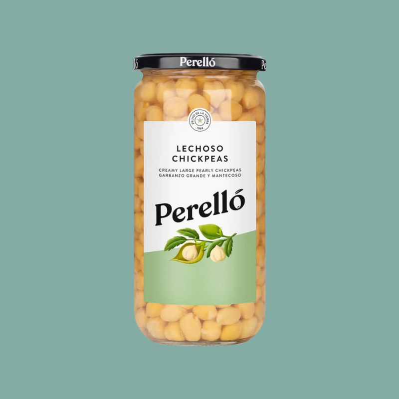 A glass jar of Perelló Lechoso Chickpeas with a black lid and a white and green label, centered on a solid teal background.