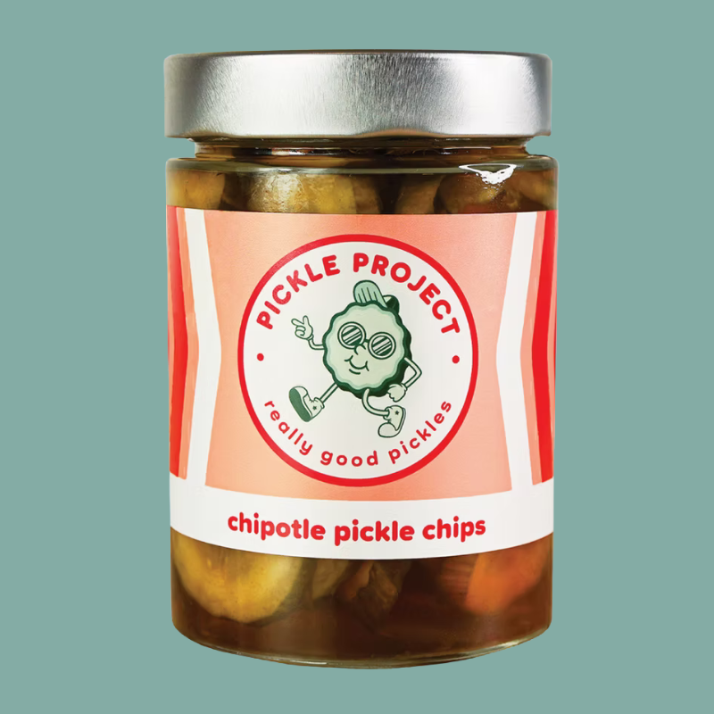 Jar of Pickle Project chipotle pickle chips on a green background